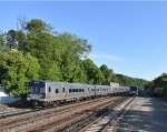 Just south of Hastings-on-Hudson Station, we have northbound MNR Train # 757 approaching while Train # 776 heads away